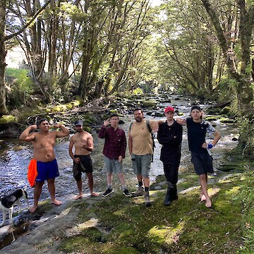 Welcome to Pekapeka camp in Tawanui (left to right) Moi (Kurī), Kaloni Taylor, Raniera Smyth, Josiah Kawana, Riki Parata, Josh Aitken and Sentre Harden.