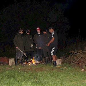 All the boys enjoying each others company around a fire that they have made. (left to right) Josiah Kawana, Sentre Harden, Josh Aitken, Raniera Smyth and Kaloni Taylor.